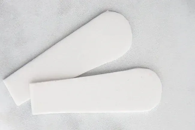 Two pieces of foam that have been fashioned to look like bunny ears