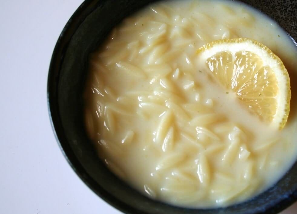 A bowl containing lemon soup