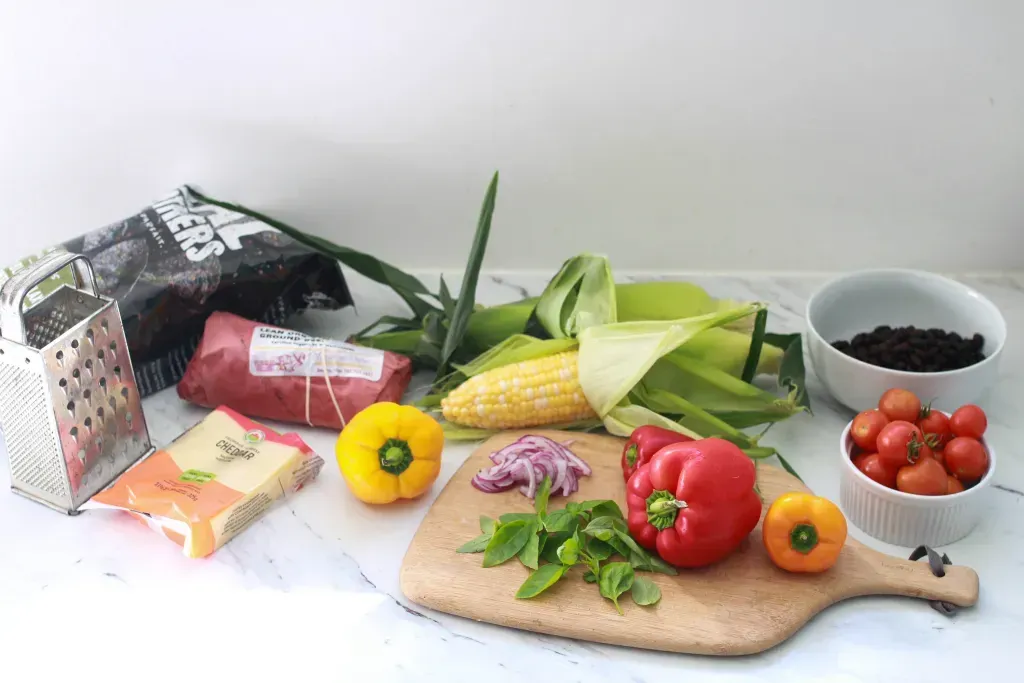 Various groceries sit on a table