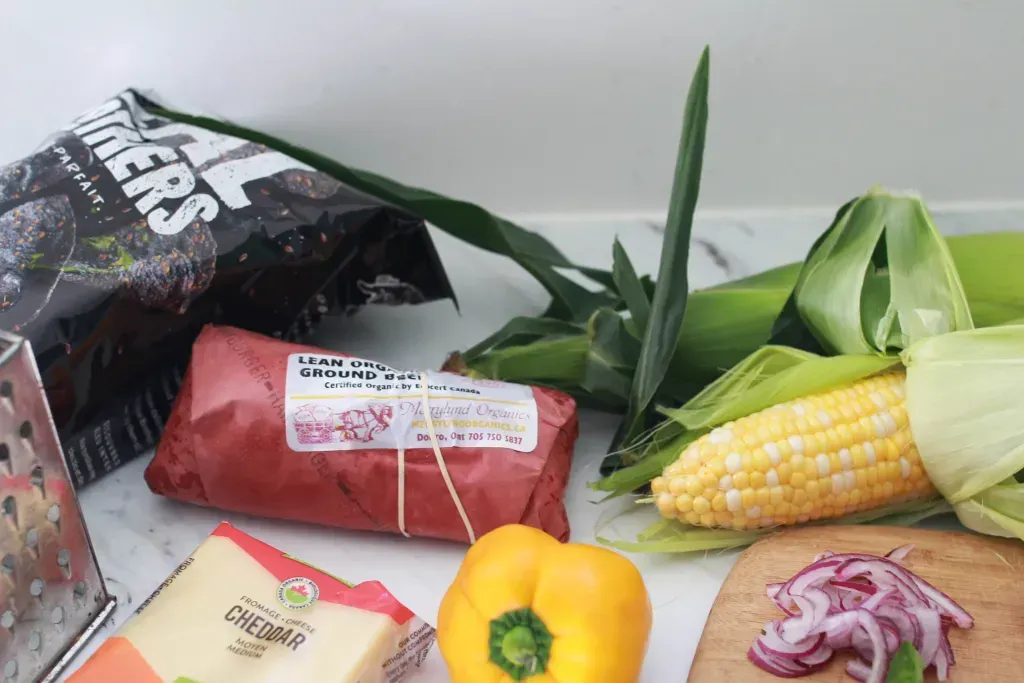 Various groceries sit on a table