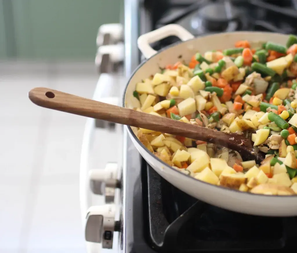 chicken pot pie ingredients in pan