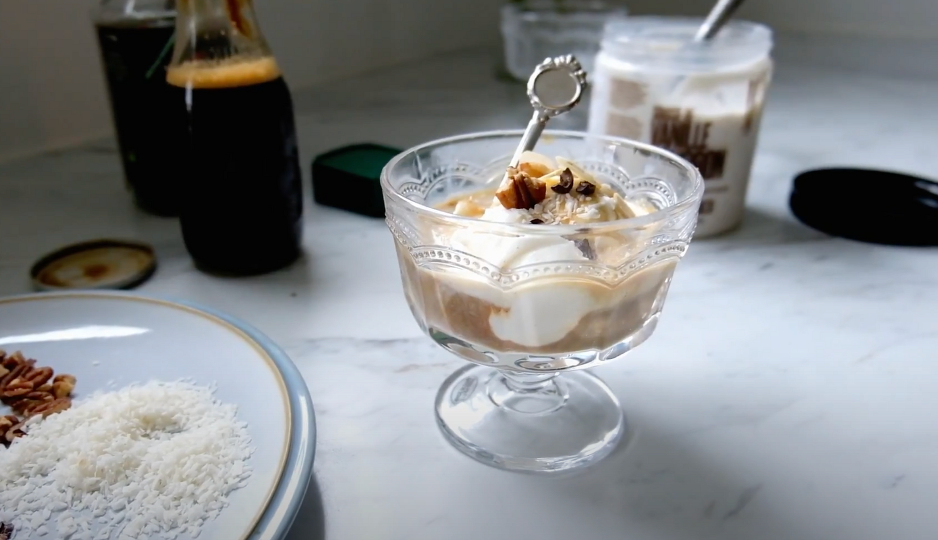 A bowl of ice cream sitting on a table