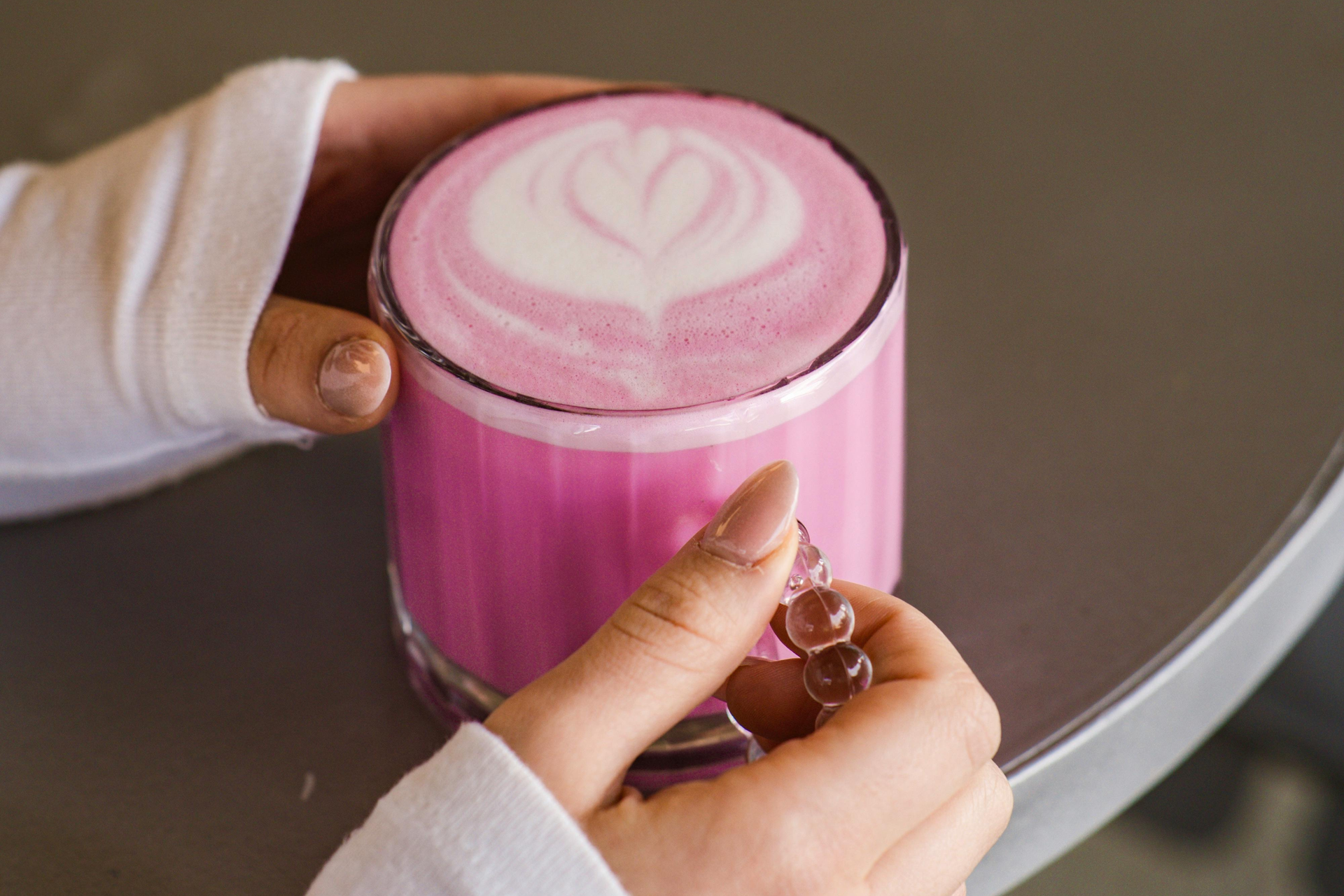 beet latte in a glass mug