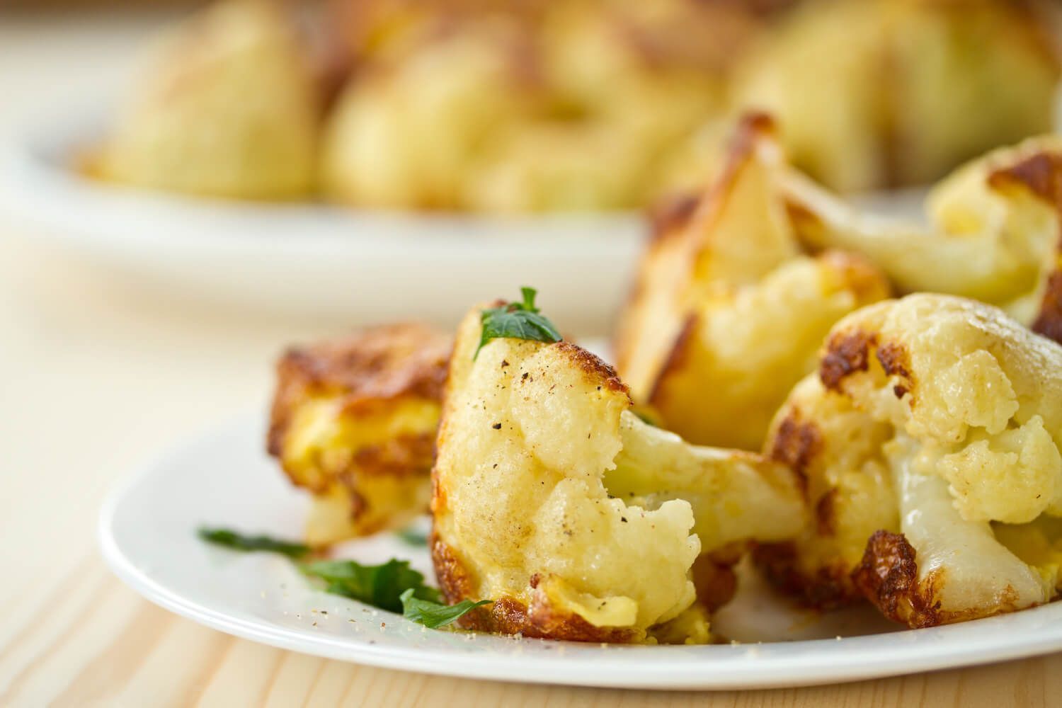 Lemon Cauliflower sits on a plate
