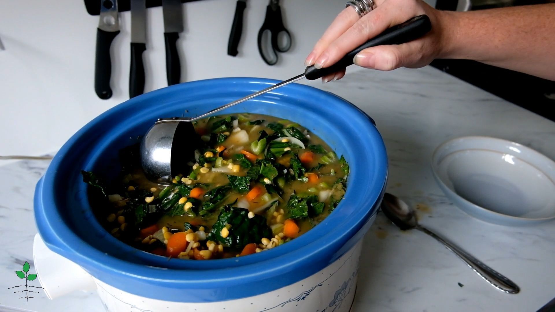 A hearty soup being made in a slow cooker