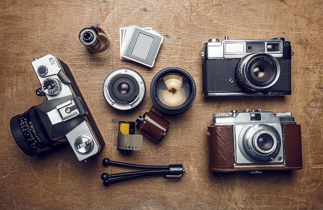 hands holding a film roll