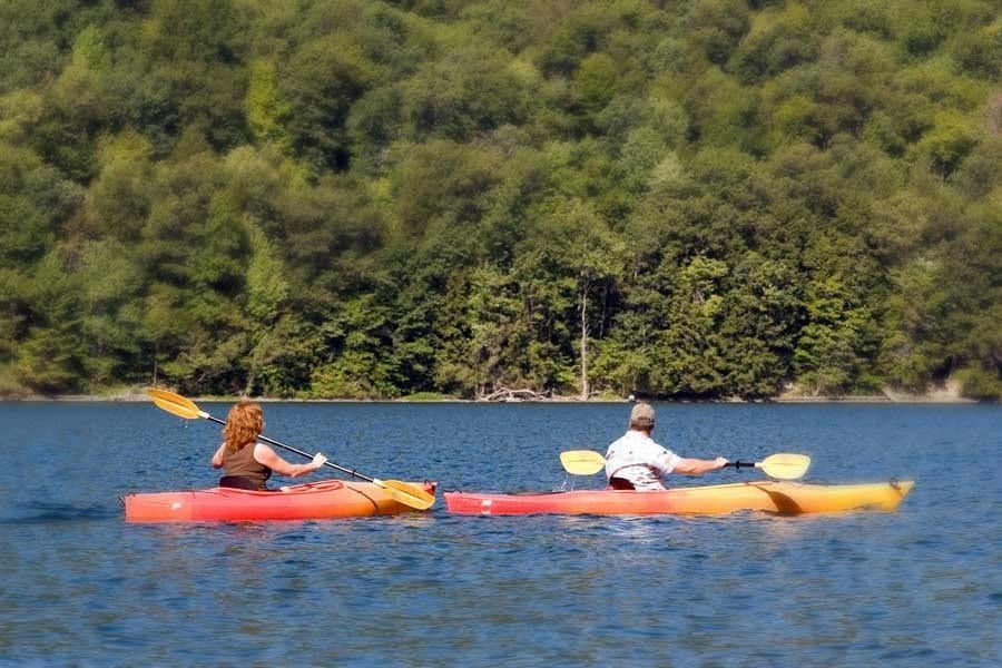 Two people kayaking on Canandaigua Lake