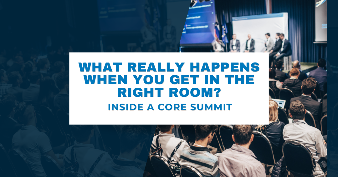 Audience seated at a CORE Summit conference with panelists on stage.