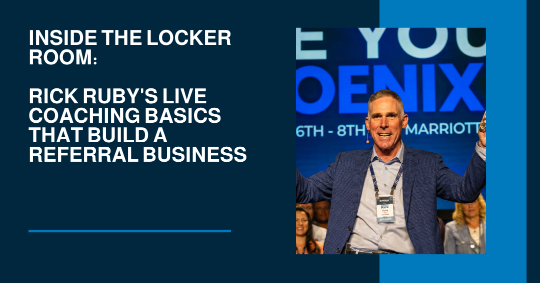Rick Ruby, founder of The CORE, smiling with arms raised while speaking on stage at a live coaching
