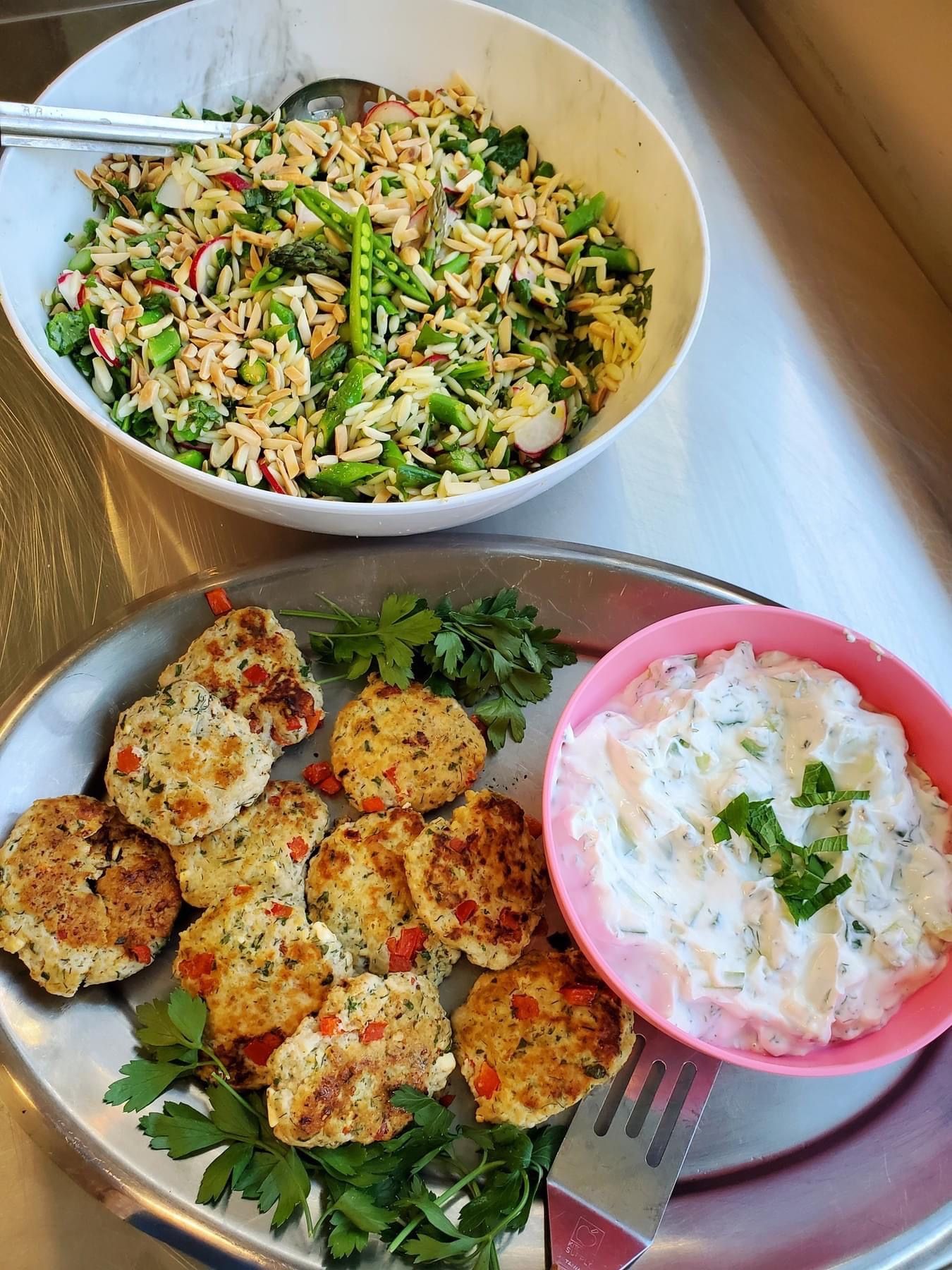Greek Lemon Feta Chicken Burgers with tzatziki with orzo herb salad with peas and asparagus