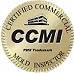 Circular gold CCMI seal with laurel wreath and “Accredited Commercial Mortgage Institute” text