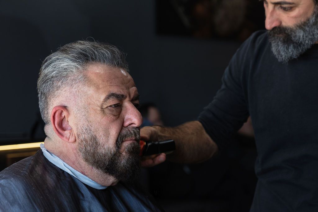 a barber shop with a tray of tools on the counter