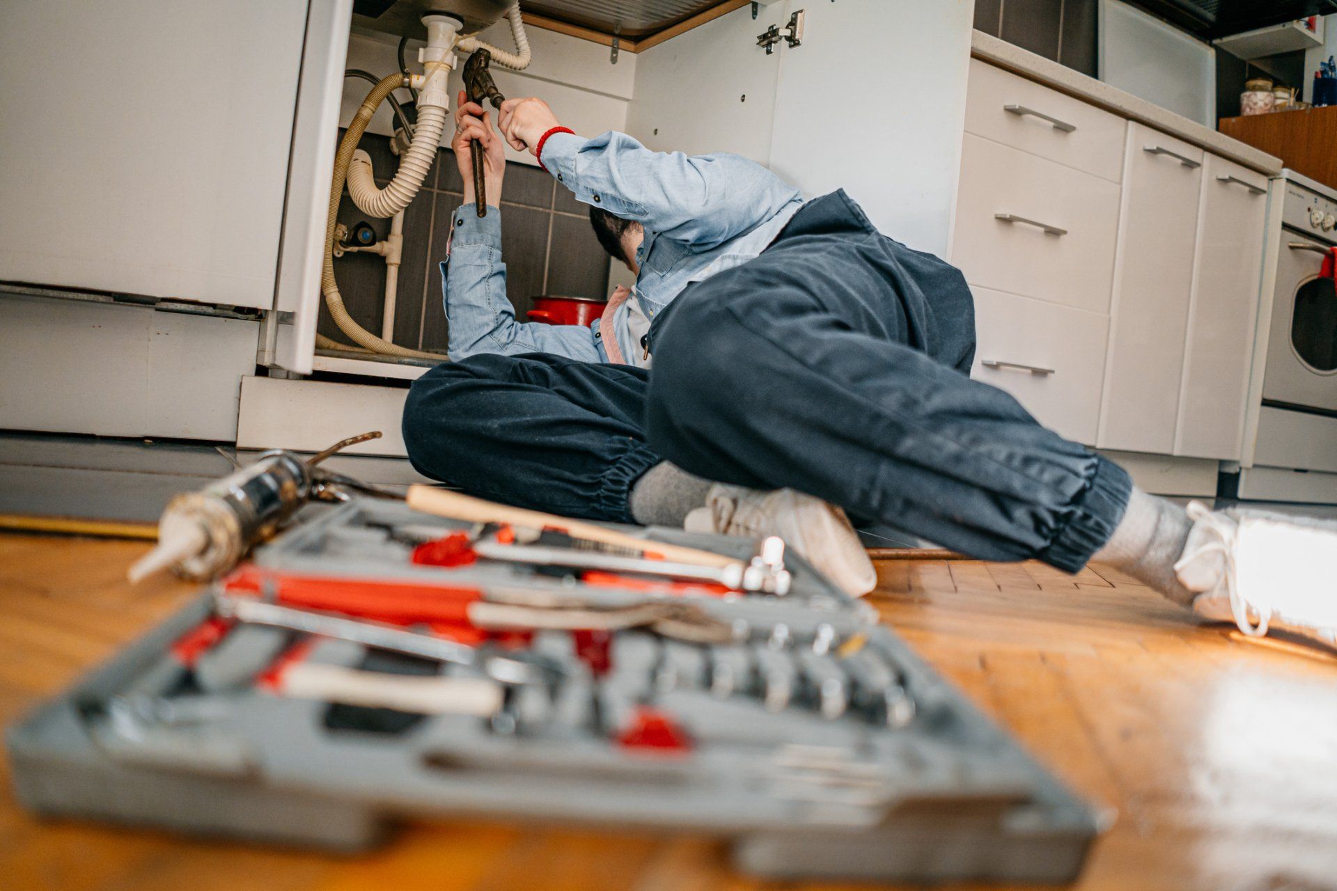Plumber fixing the sink | Cornelia, GA | Dockery’s Electrical, Plumbing, Heating, and Air