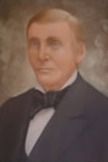 Portrait of Seth G. Tufts. He has light hair and a neutral expression. 