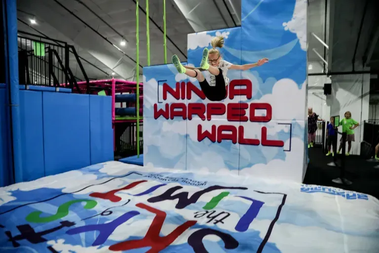 Girl jumping off a