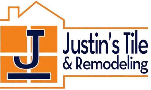 Justin’s Tile & Remodeling logo with orange house outline and navy text