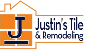Justin’s Tile & Remodeling logo with orange house outline and navy text