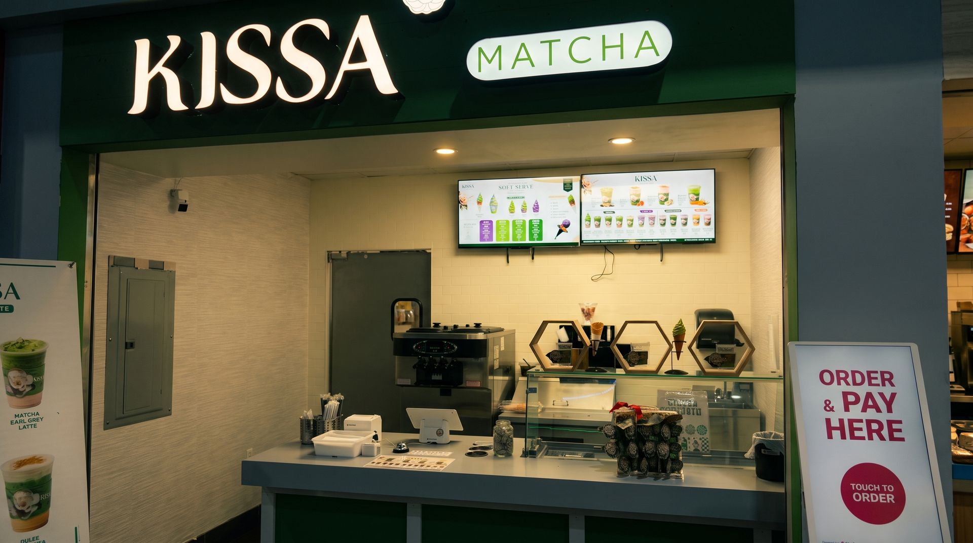 KJSSA Matcha café counter with menu boards and an “Order & Pay Here” sign