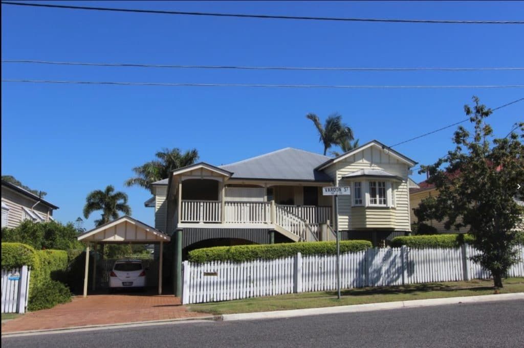 A House With a White Fence and a Car in the Driveway β Peterson Property Valuations In Caloundra West, QLD