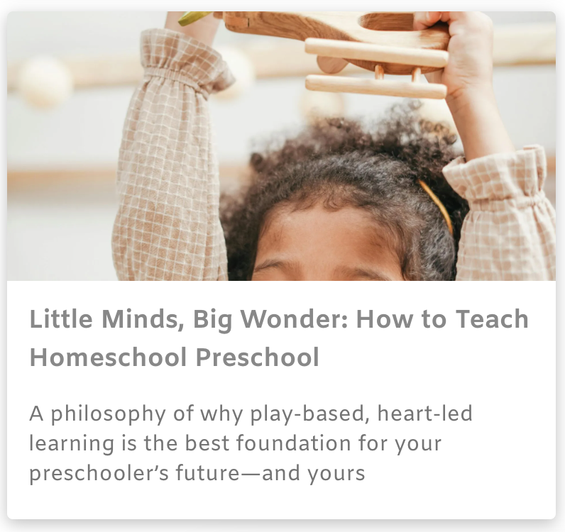 Child reaching for a wooden toy on a white play gym with text about teaching homeschool preschool