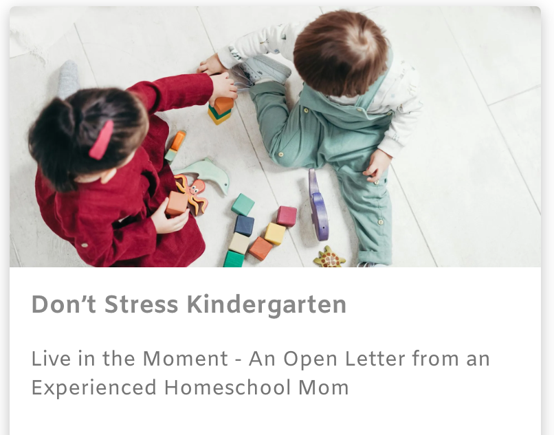 Two children play with colorful blocks on a white floor, with article text about kindergarten below.