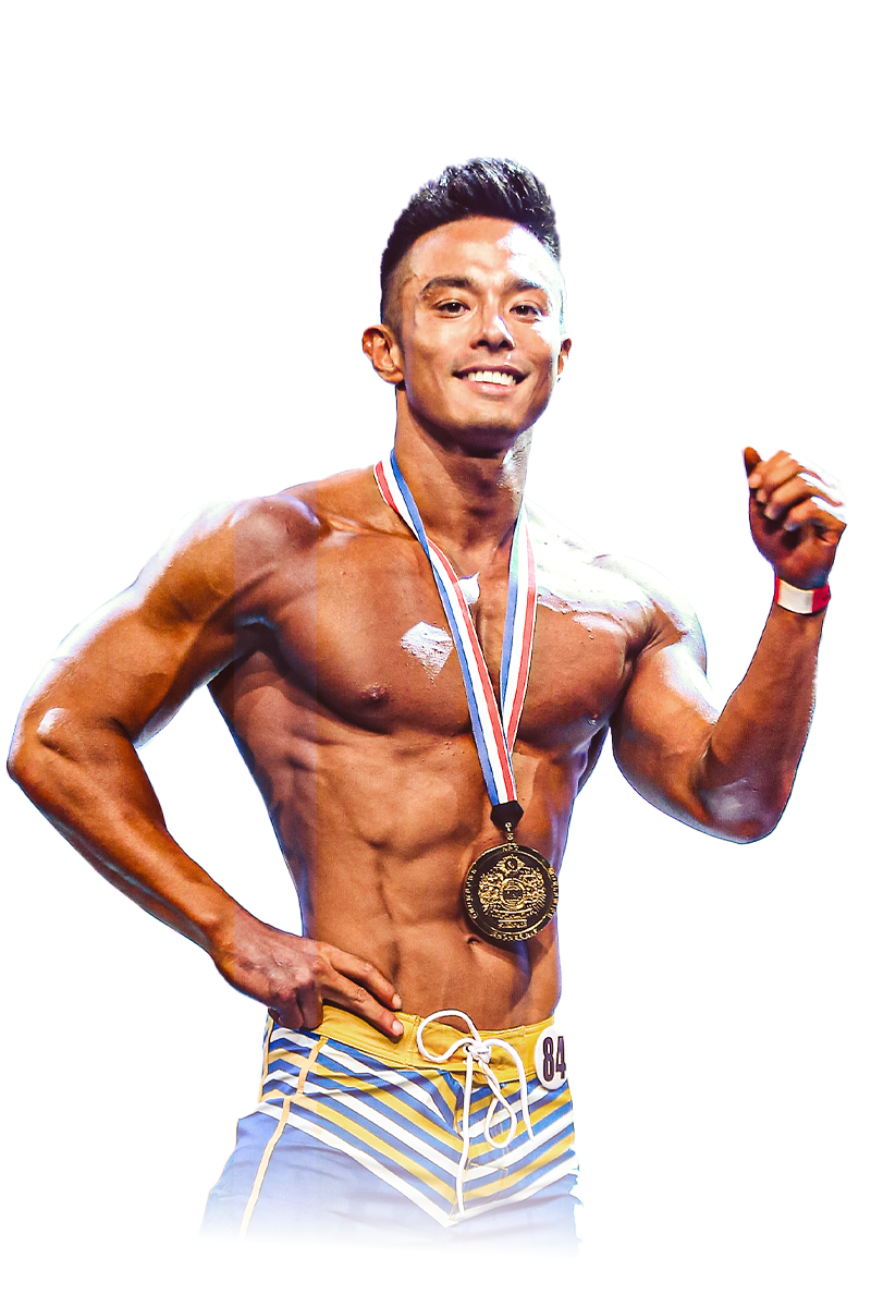 Andee Teo is wearing a medal around his neck.