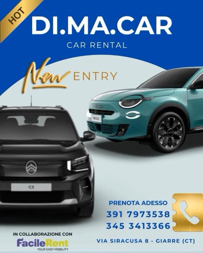 Furgoni bianchi parcheggiati in un parcheggio, vista posteriore.