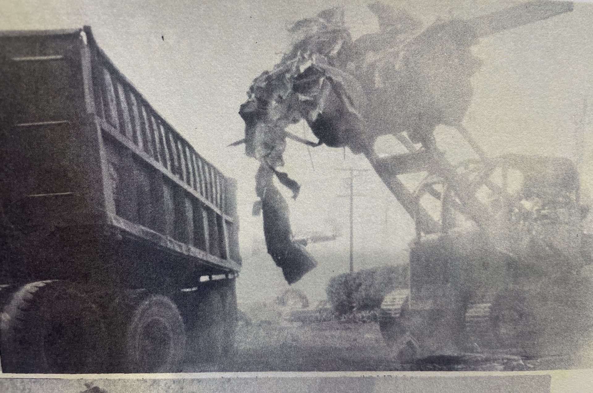 Black and White Photo of Excavator and Truck — Chicago, IL — Sterling Holloway Demolition 