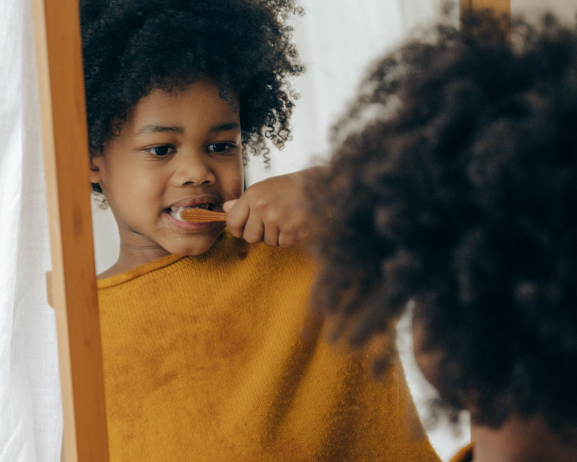 Girl Brushing Her Teeth