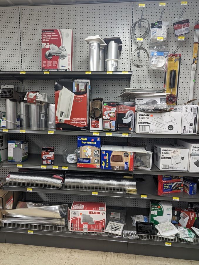 A store filled with shelves of HVAC supplies.