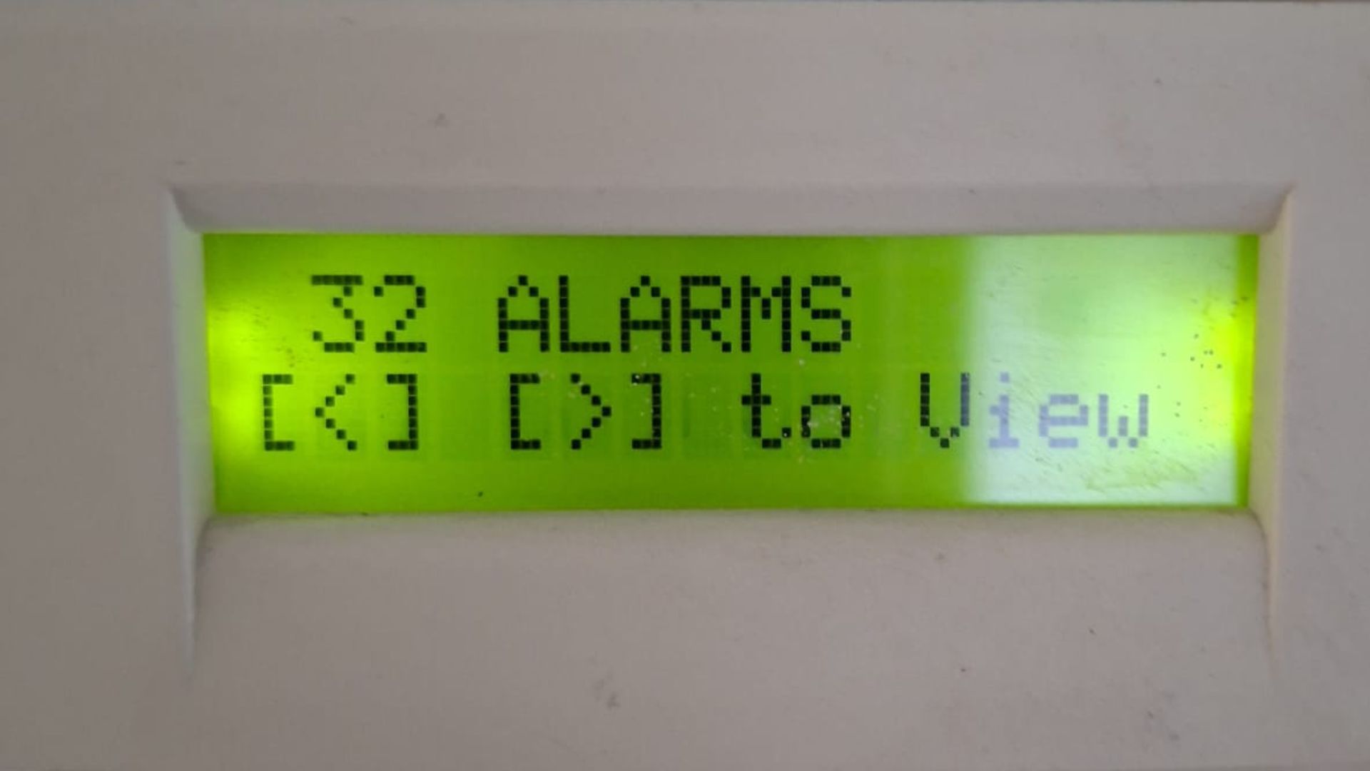 The display screen of an alarm system, reading ‘32 Alarms’.