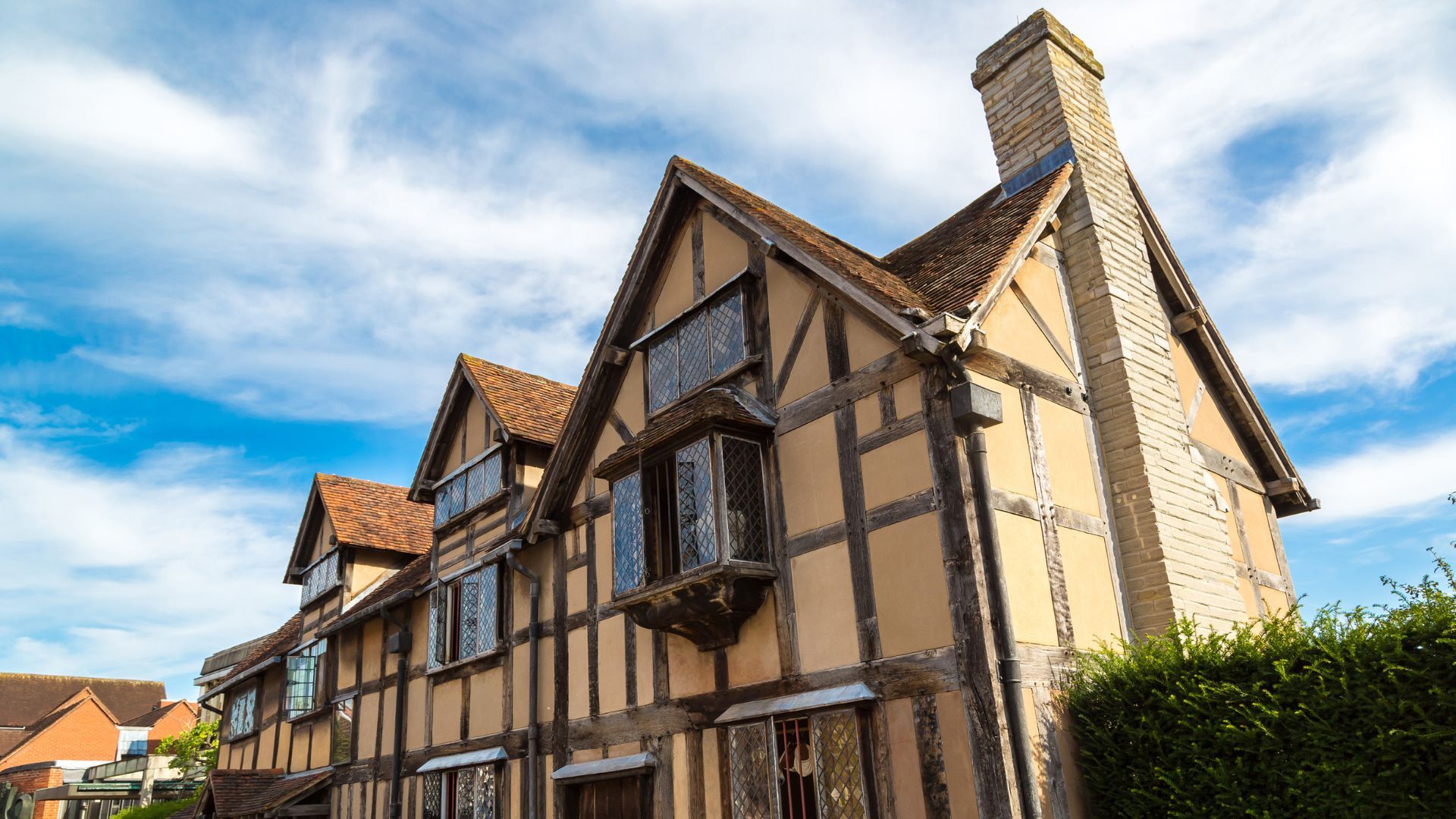 Shakespeare’s Birthplace under a blue sky in Stratford-upon-Avon
