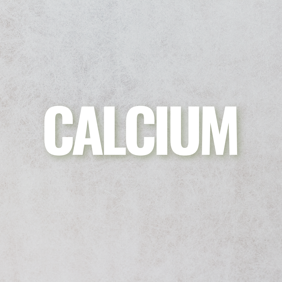 A variety of foods containing calcium are on a table.