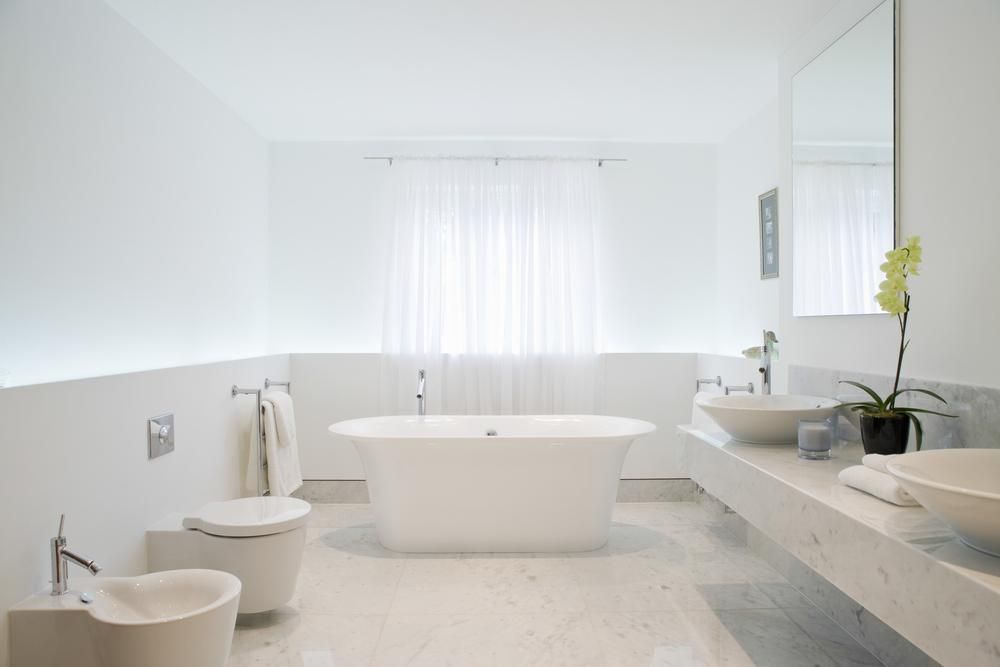 A Bathroom with A Bathtub , Toilet , Sink and Bidet — Mezcon Renovations & Maintenance in Eaglemont, VIC