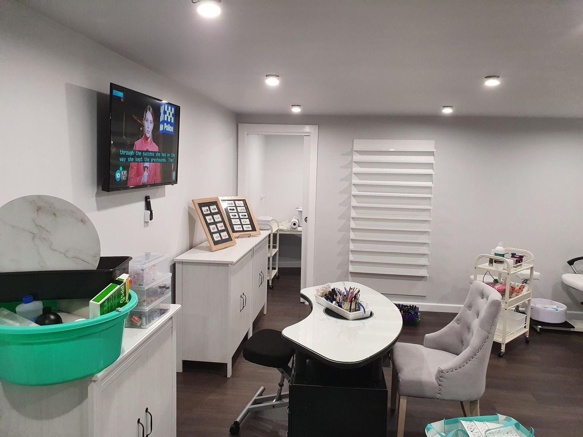 Nail Salon Interior Manicure Table, Chairs, White Cabinets — Mezcon Renovations & Maintenance in Heidelberg, VIC