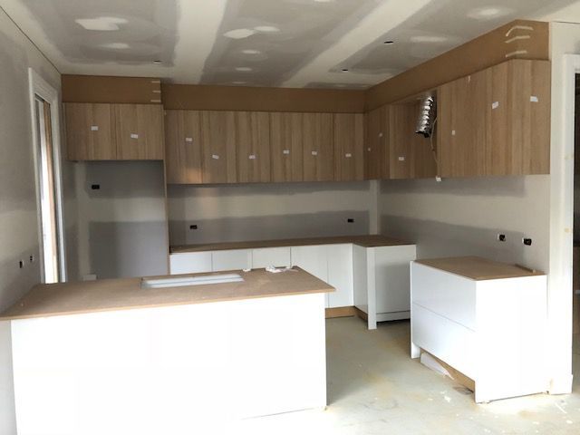Kitchen under construction with light wood cabinets — Mezcon Renovations & Maintenance in Heidelberg, VIC