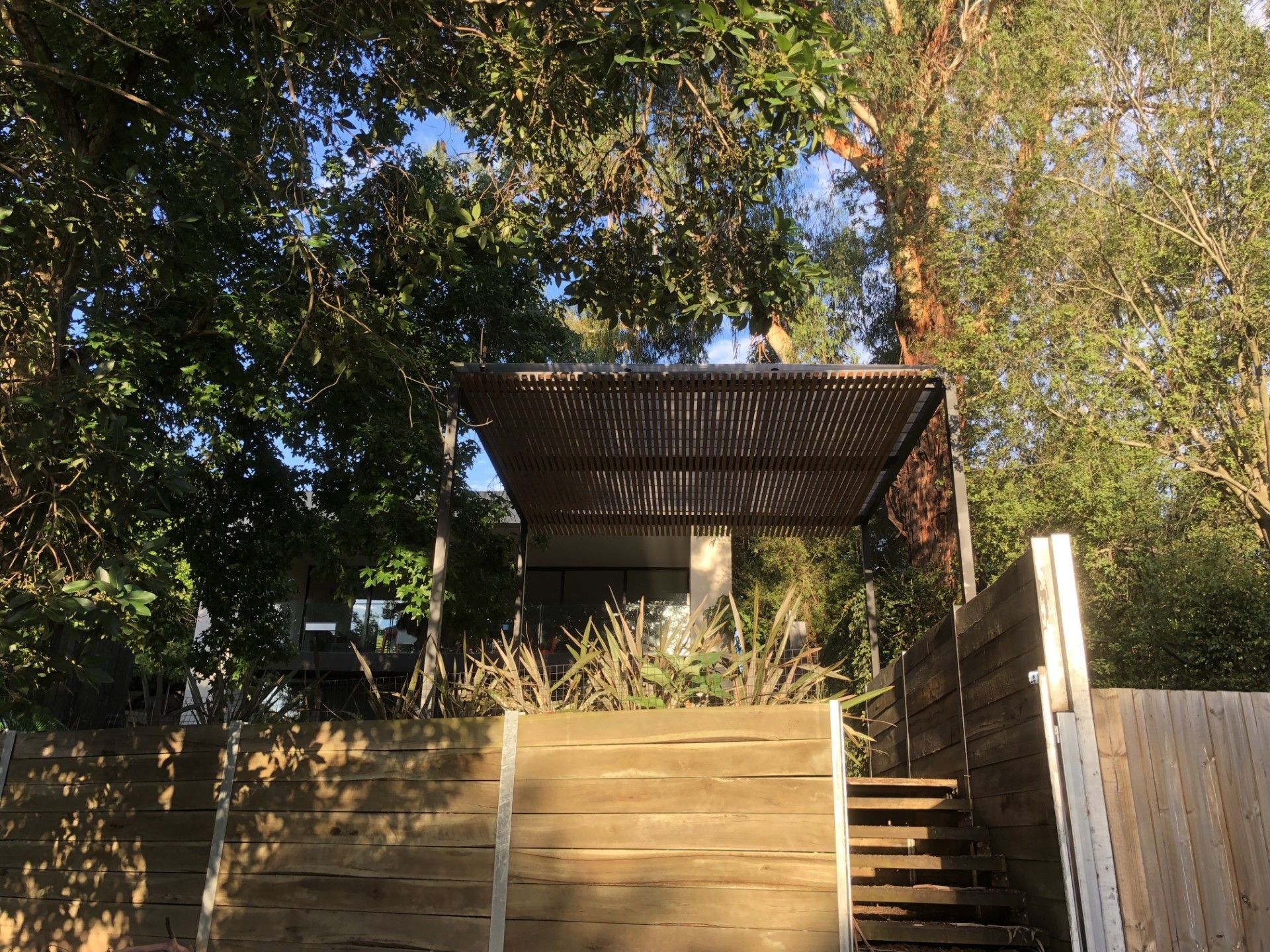 A House Is Being Built with A Concrete Walkway in Front of It — Mezcon Renovations & Maintenance in Heidelberg, VIC