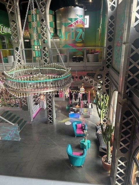 An aerial view of a building with a chandelier hanging from the ceiling.