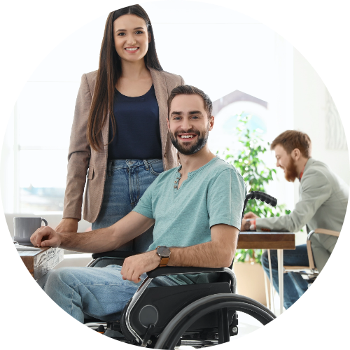 woman next to man in wheelchair