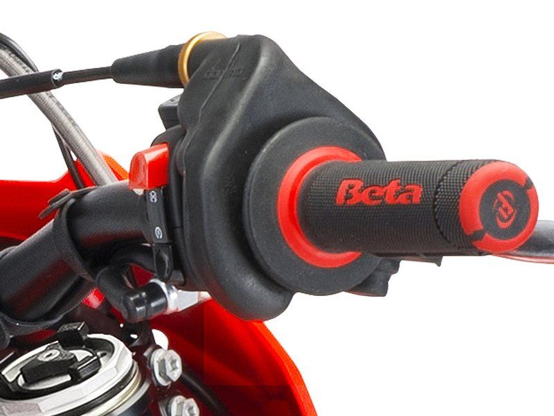 A close up of a beta throttle on a motorcycle