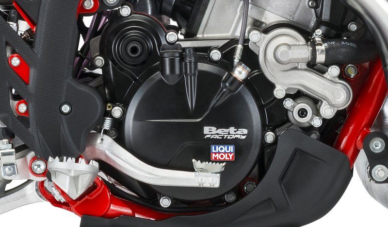 A close up of a motorcycle engine with liqui moly written on it
