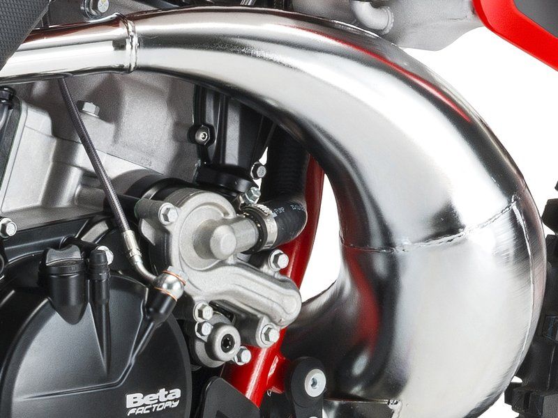 A close up of the engine of a beta motorcycle