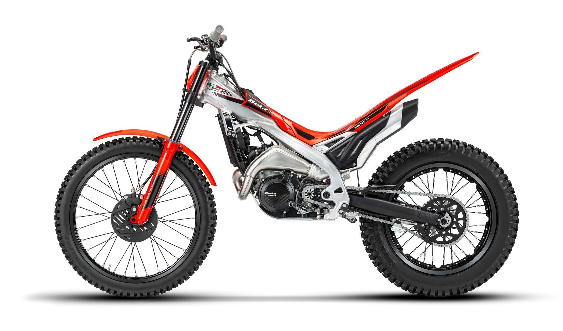 Red and black dirt bike on a white background, side view