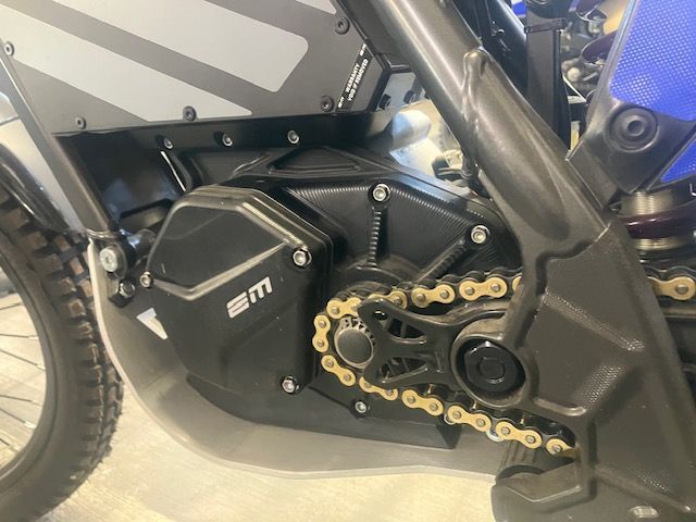A close up of the engine of a motorcycle