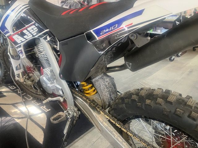 A dirt bike with ajp written on the seat