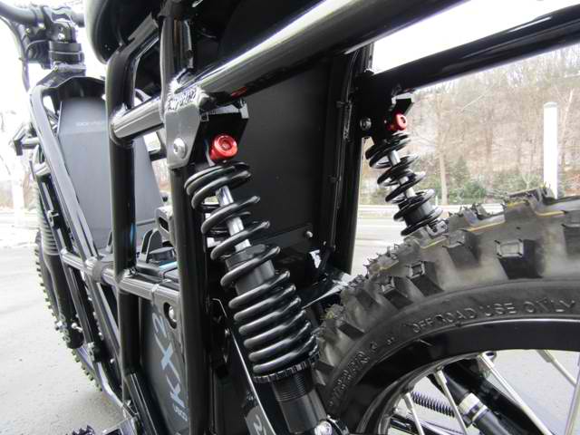 A close up of a shock on a motorcycle