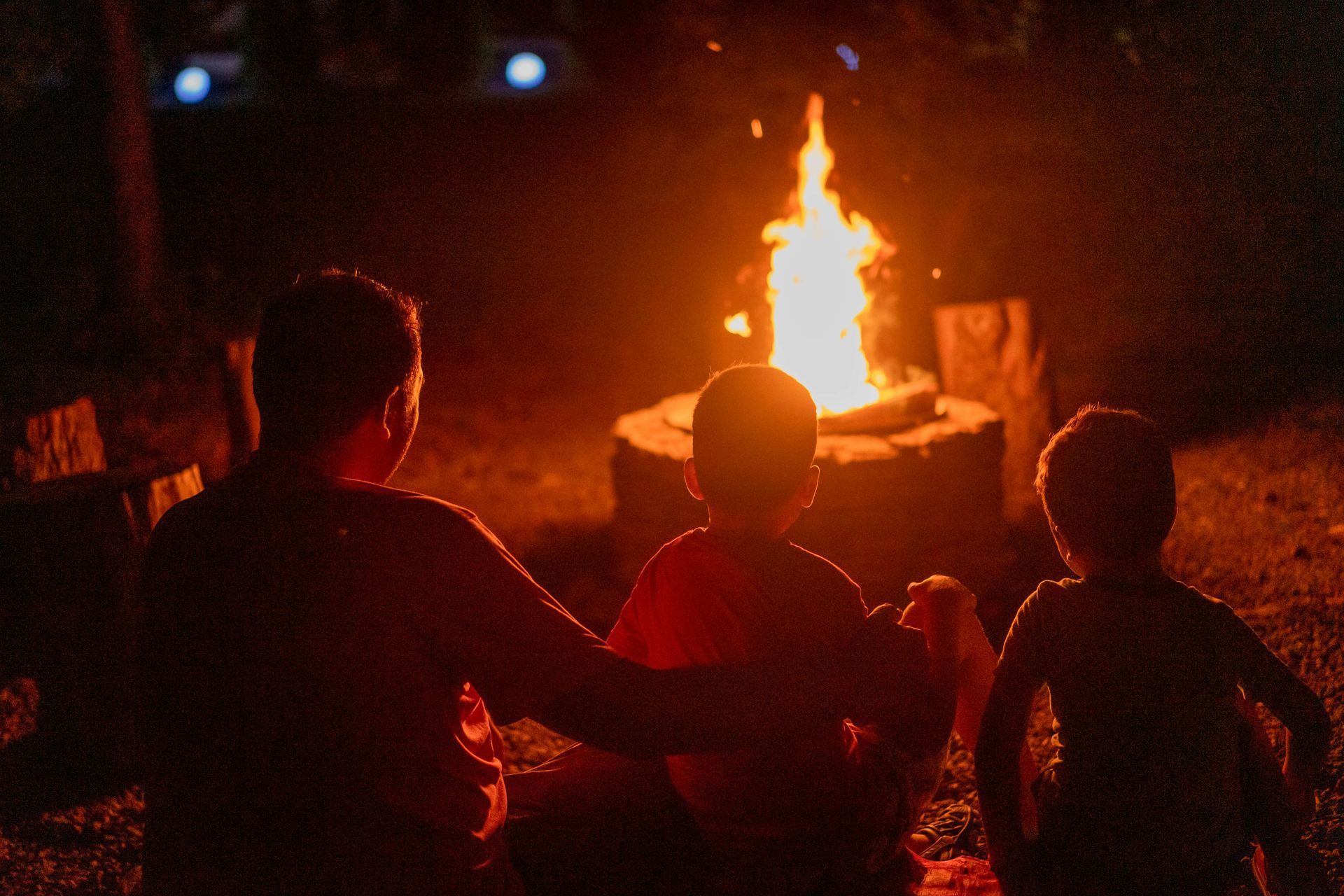 family with fire pit