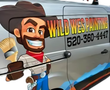 Wild Wes Painting LLC Cartoon cowboy with a paintbrush, advertising