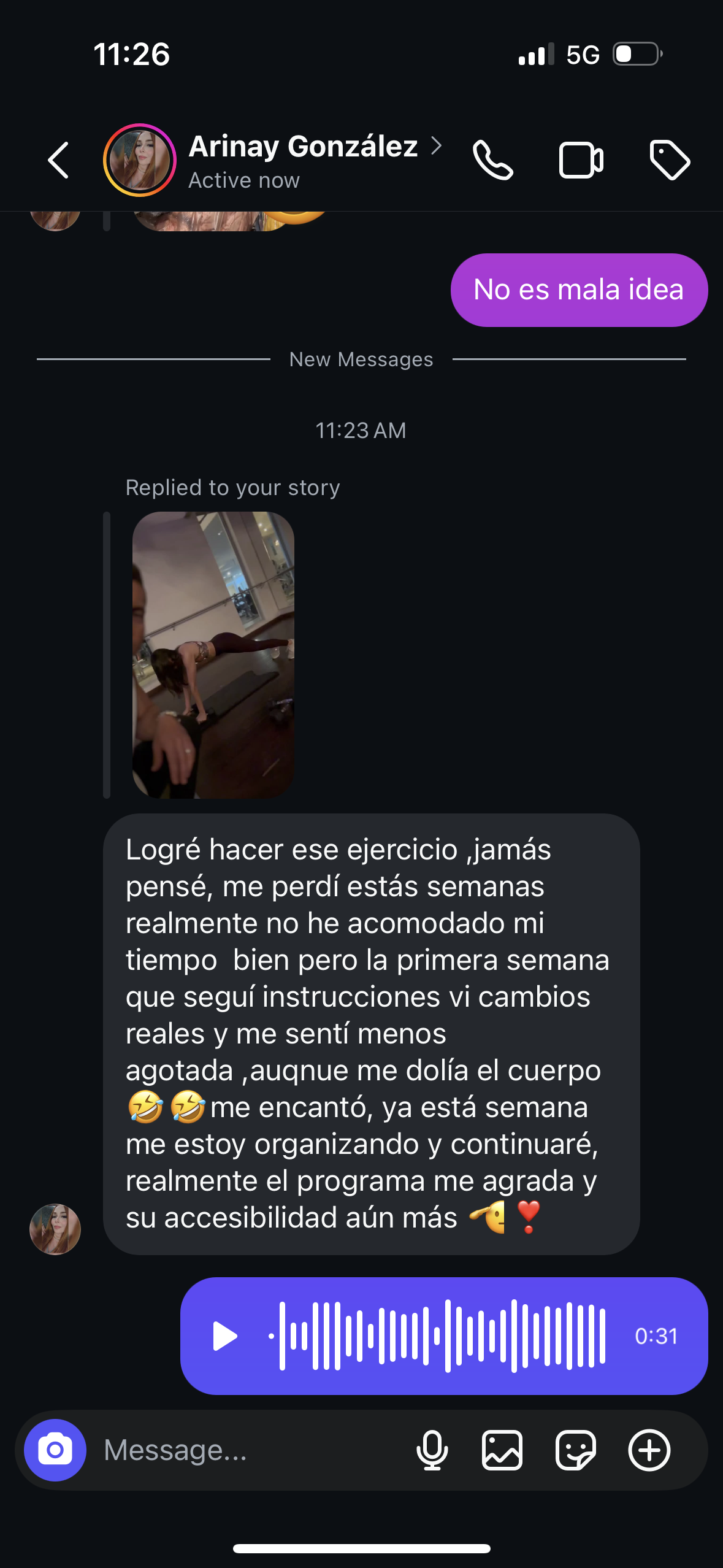 Dark-mode messaging app chat with a shared photo, long text reply, and purple voice message bubble on screen