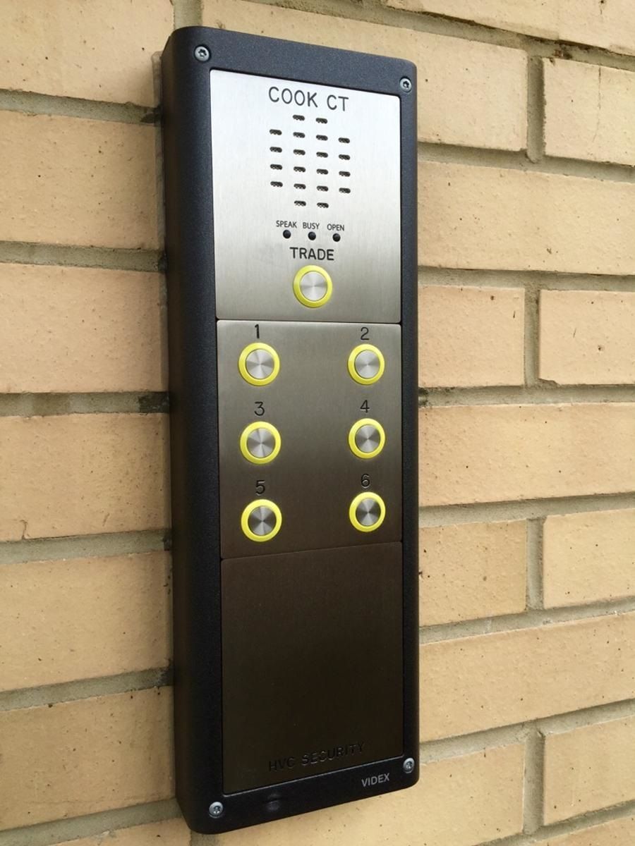 a cook ct device is mounted on a brick wall